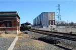 NS 4480 Passes Between Old and New Buildings